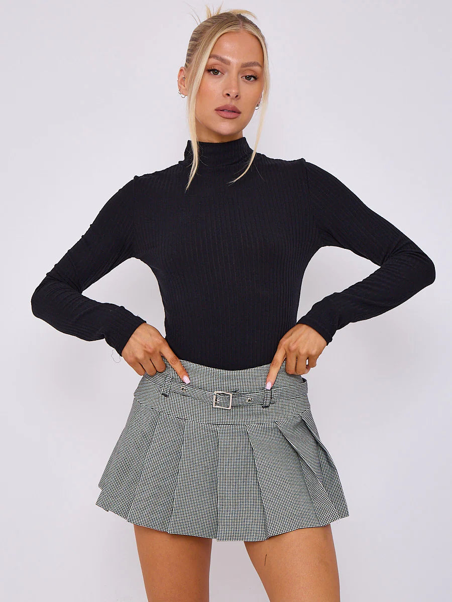 dogtooth pleated mini tennis skort with belt closeup