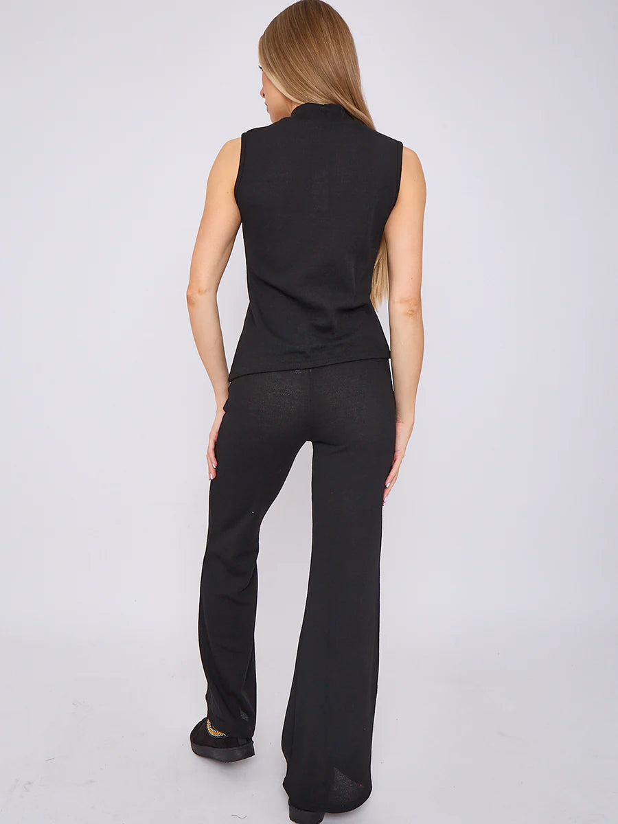 woven knit asymmetric high neck sleeveless top flared trouser co ord black rear