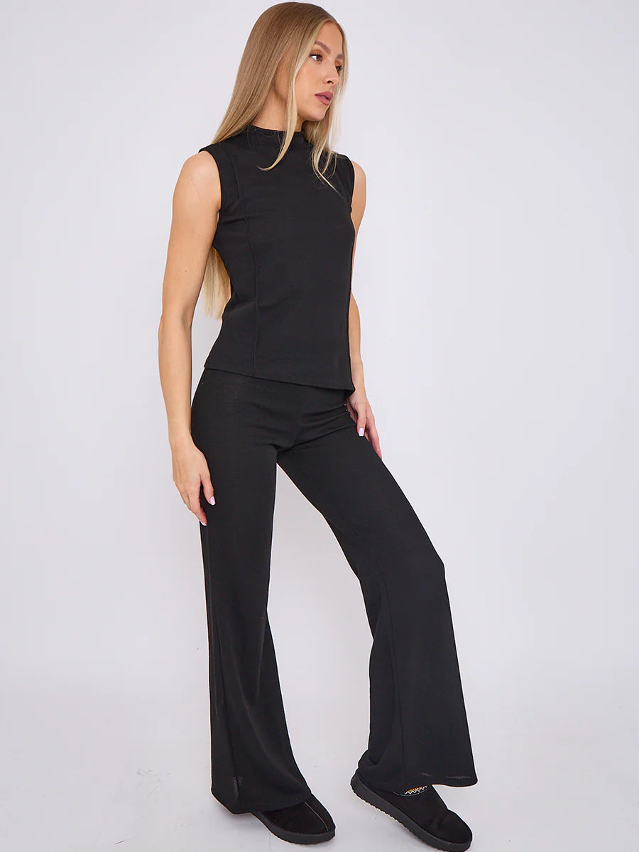 woven knit asymmetric high neck sleeveless top flared trouser co ord black side