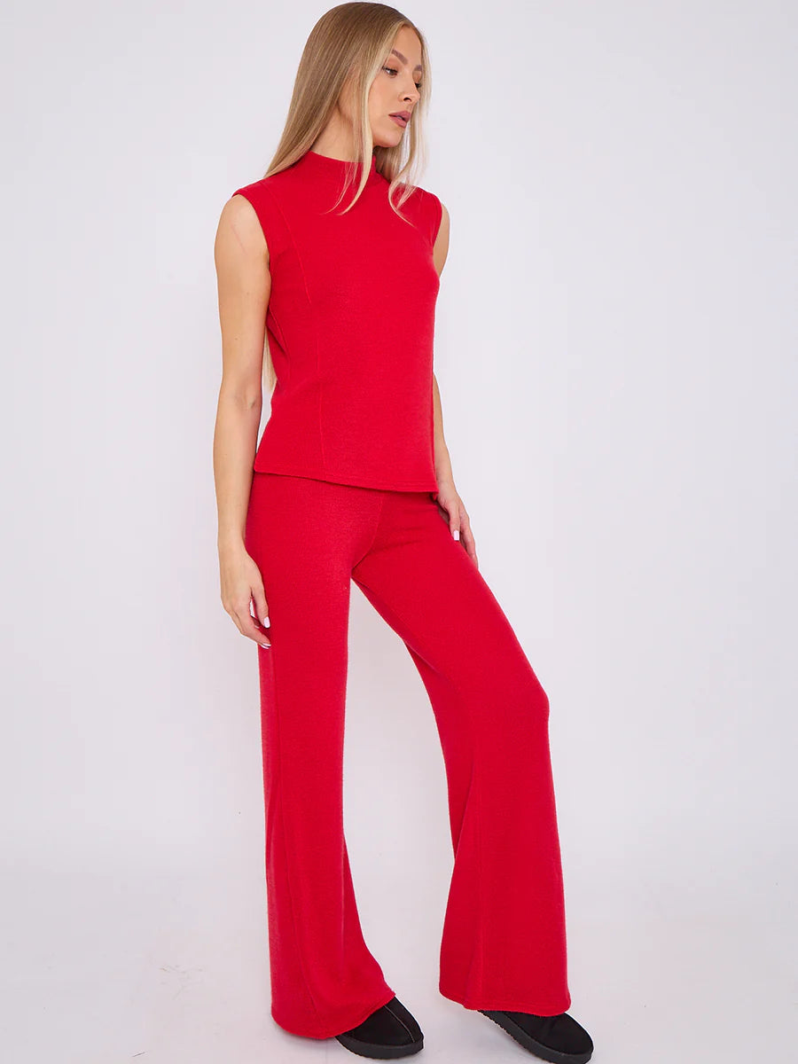 woven knit asymmetric high neck sleeveless top flared trouser co ord red side