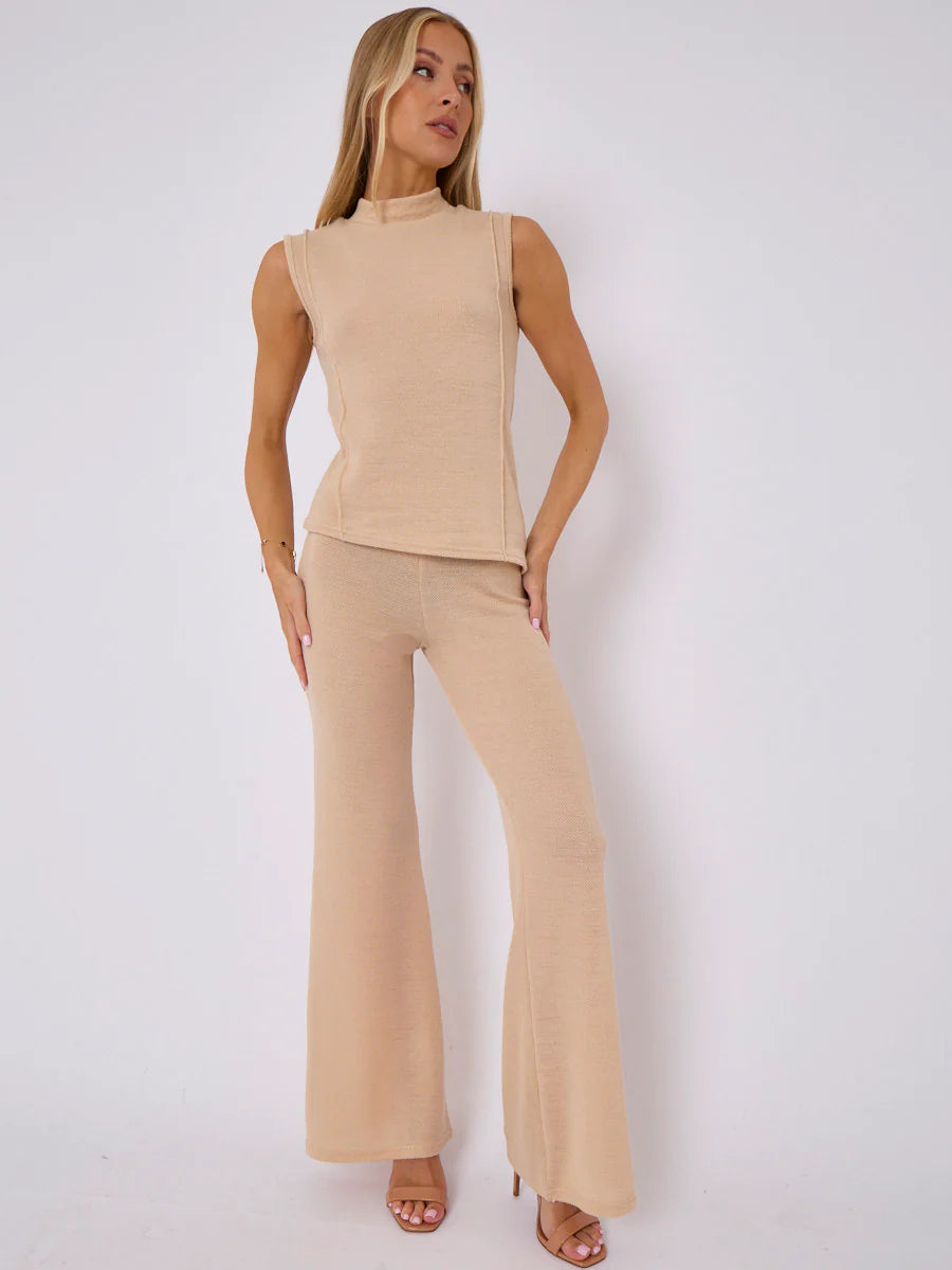 woven knit asymmetric high neck sleeveless top flared trouser co ord stone side